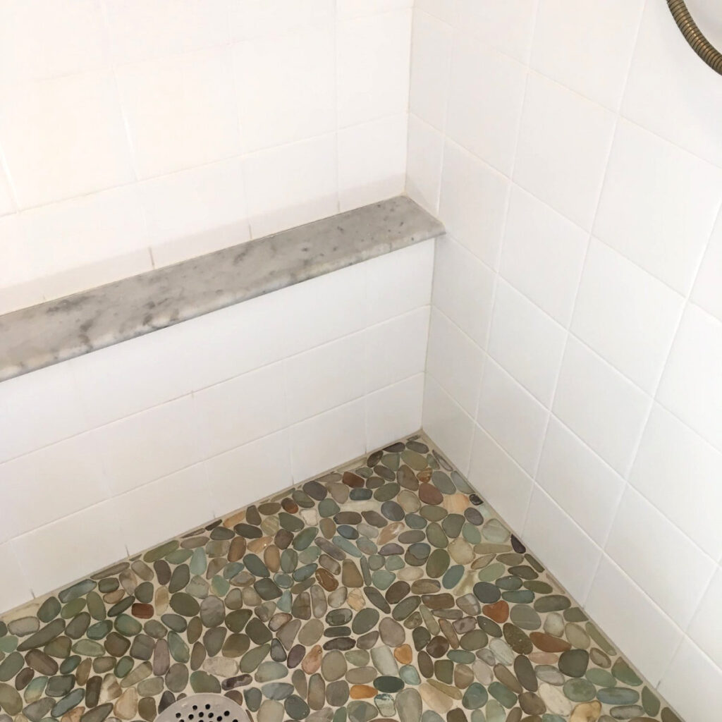 recalking & regrouting natural tile shower