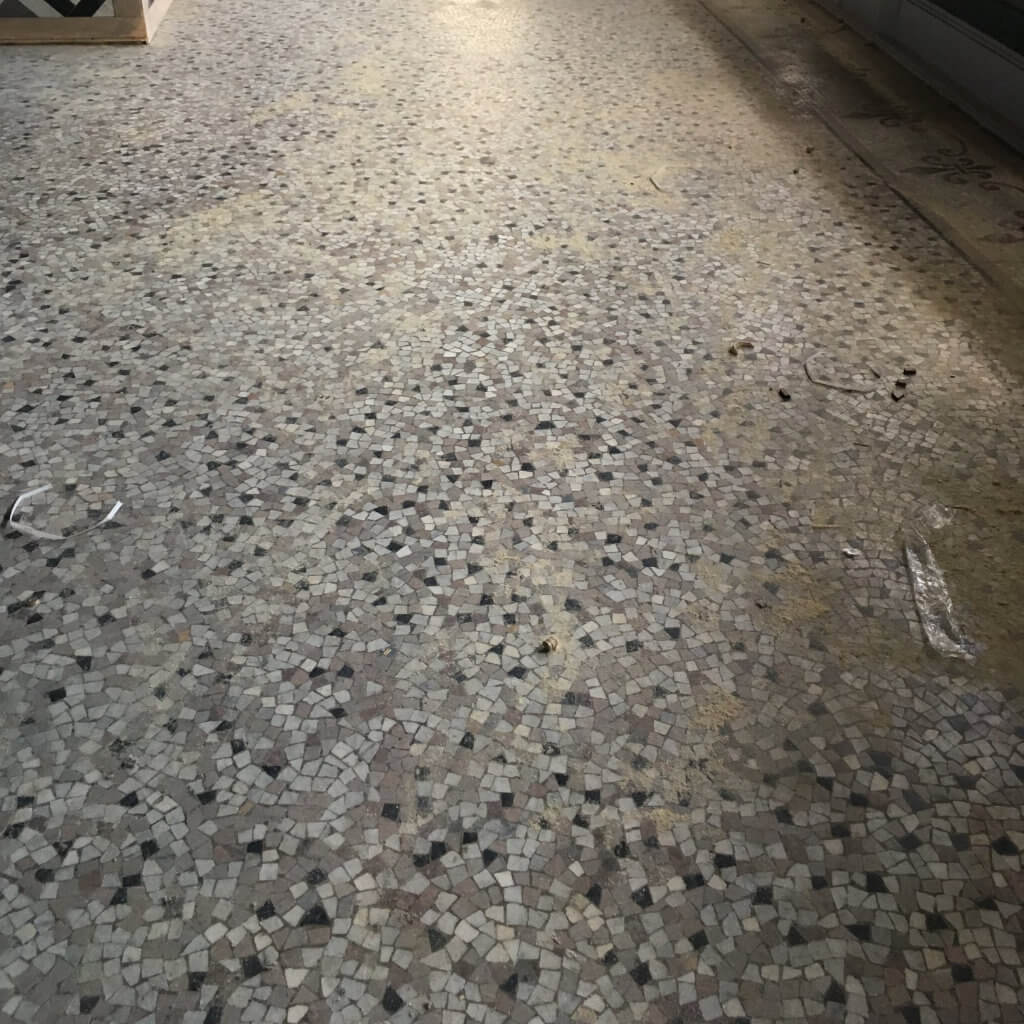 Dull cloudy terrazzo floor before cleaning and sealing