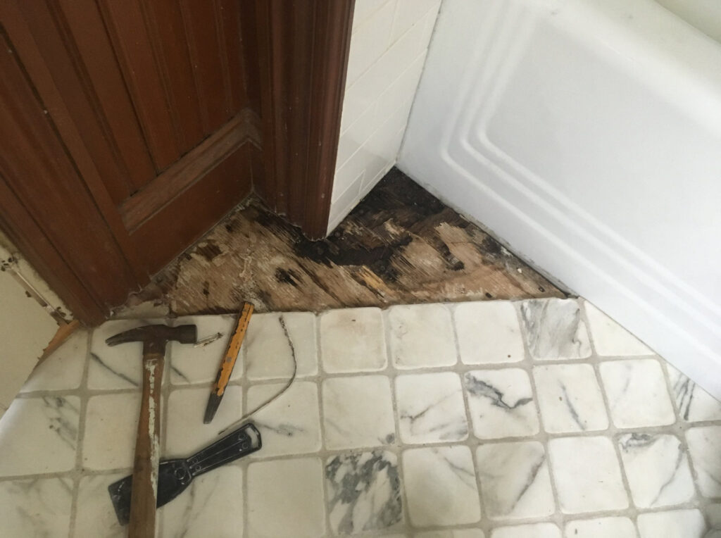 Stained marble tile cleaning, sealing and water damage repair - during image